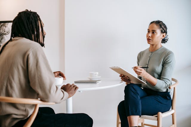 property manager and tenant conducting tenant screening
